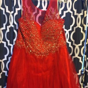 Red sequins homecoming or prom dress.